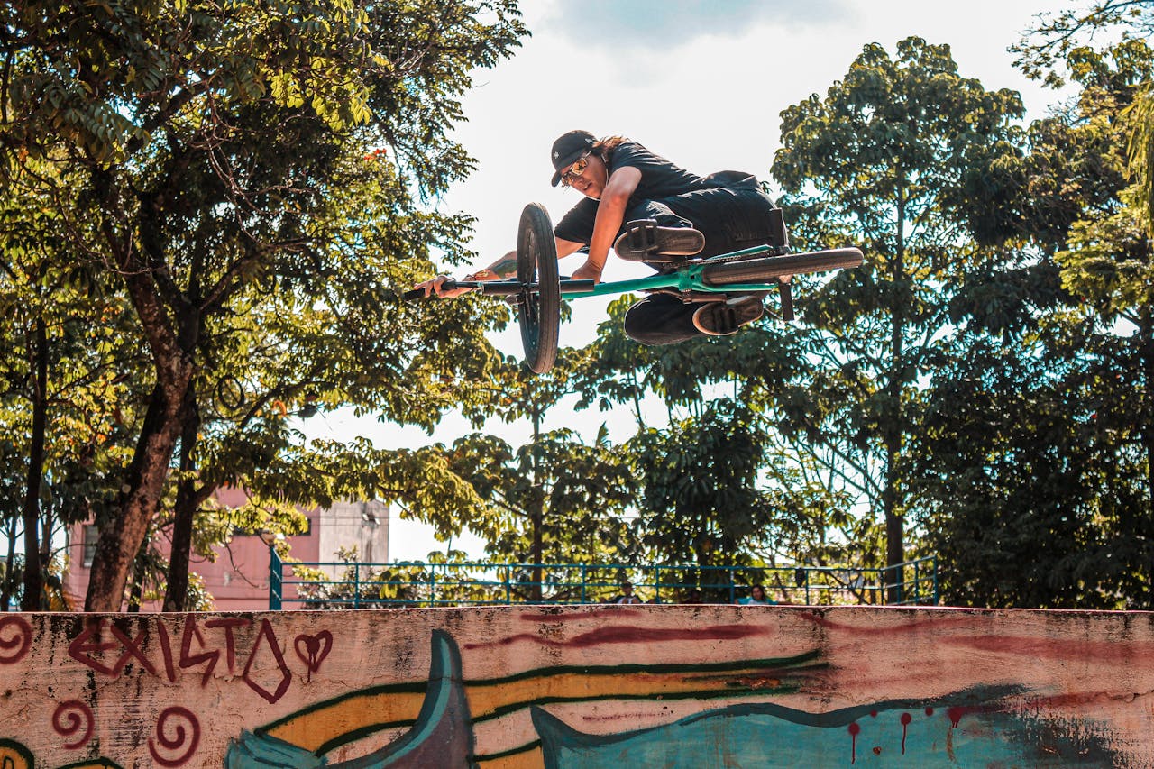Dynamic BMX stunt performed by a young athlete in a vibrant Brazilian skatepark, showcasing skill and excitement.
